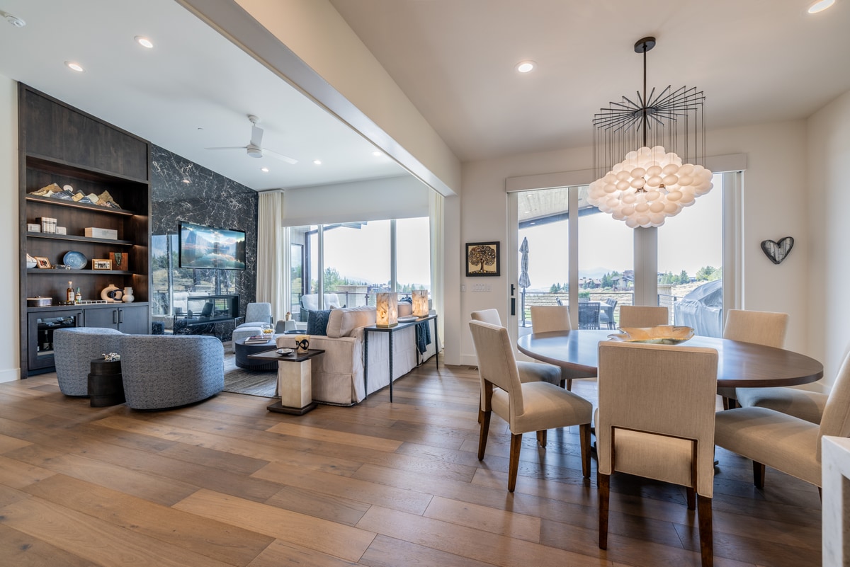 Ranch Gardens Park City Utah — dining area with sculptural bubble chandelier and open connection to media lounge